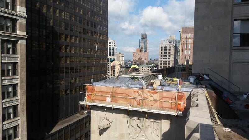 A crew setting up for a scaffold drop in the Flatiron district of Manhahttan. John S Moller