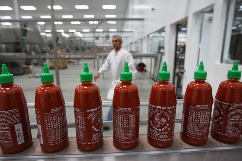 Bottles are produced for Sriracha Hot Chili Sauce at the Huy Fong Foods plant. David McNew / Getty Images / AFP