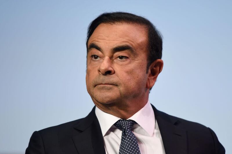 (FILES) In this file picture taken on October 1, 2018 Nissan Motors Chairman and CEO Carlos Ghosn attends the event "Tomorrow in Motion" on the eve of the first press day of the Paris Motor Show in Paris. Prosecutors have rearrested former Nissan boss Carlos Ghosn over fresh allegations of breach of trust, local media said on December 21, 2018, in the latest twist to a rollercoaster saga. - 
 / AFP / ERIC PIERMONT
