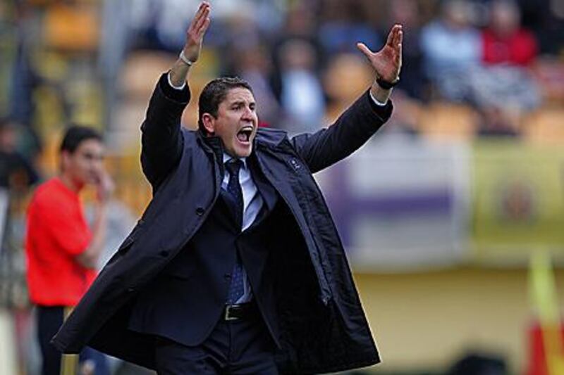 Villarreal’s ambitious coach, Juan Carlos Garrido, makes his feelings known from the touchline during a Primera Liga game at El Madrigal stadium.