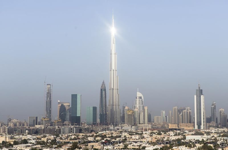 The Burj Khalifa, centre, and Dubai World Trade Centre have had an earthquake-detection system installed. Reem Mohammed / The National