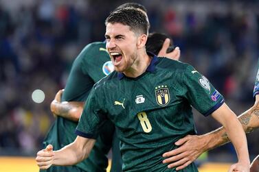 Italy midfielder Jorginho celebrates after scoring the first goal against Greece from the penalty spot. EPA