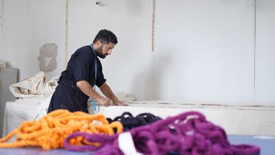 Osman Yousefzada in the workshop in Karachi where he produced the tapestries for the V&A. Photo: Osman Yousefzada 