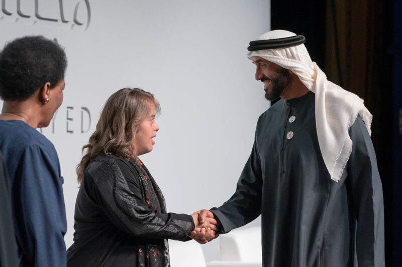 ABU DHABI, UNITED ARAB EMIRATES - March 13, 2019: HH Sheikh Nahyan Bin Zayed Al Nahyan, Chairman of the Board of Trustees of Zayed bin Sultan Al Nahyan Charitable and Humanitarian Foundation (R), greets Special Olympics athlete, Chaica Al Qassimi (2nd L), after a lecture by Loretta Claiborne, Chief Inspiration Officer, Vice Chair of the Special Olympics International Board of Directors (L), titled "Changing the Game for Inclusion", at Emirates Palace. 
( Ryan Carter / Ministry of Presidential Affairs )?