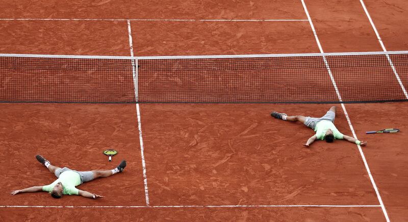 Kevin Krawietz and Andreas Mies of Germany react after winning the Men's doubles final match during the French Open tennis tournament at Roland Garros in Paris. EPA