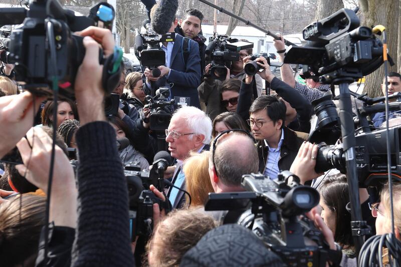 Vermont Senator Bernie Sanders talks to media after casting his ballot at a polling location inside a community center in Burlington, Vermont. EPA