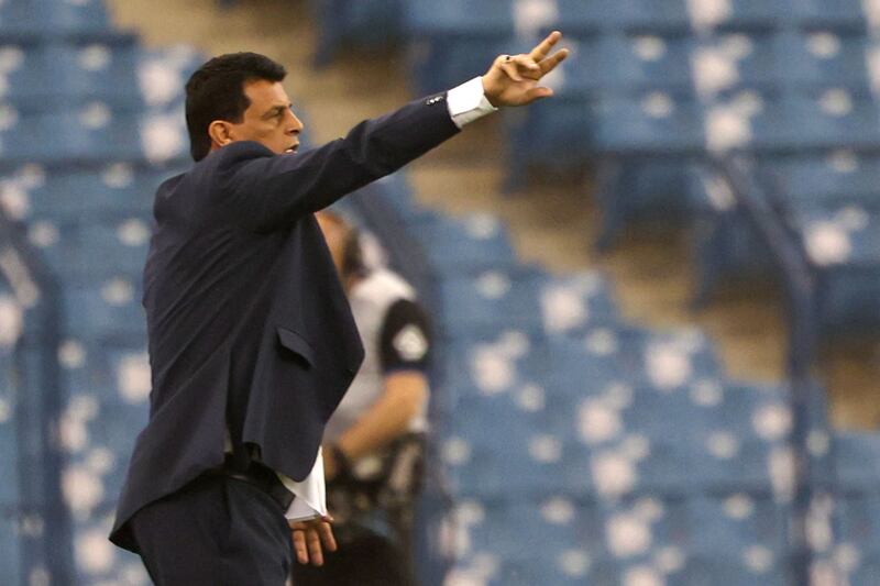 Iraq's coach Abdul-Ghani Shahad reacts on the touchline.  AFP