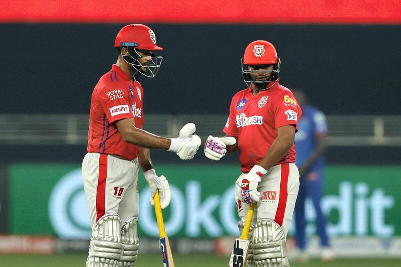 Mayank Agarwal of Kings XI Punjab  and Sarfaraz Khan of Kings XI Punjab  congratulating during match 2 of season 13 of Dream 11 Indian Premier League (IPL) between Delhi Capitals and Kings XI Punjab held at the Dubai International Cricket Stadium, Dubai in the United Arab Emirates on the 20th September 2020.  Photo by: Saikat Das  / Sportzpics for BCCI