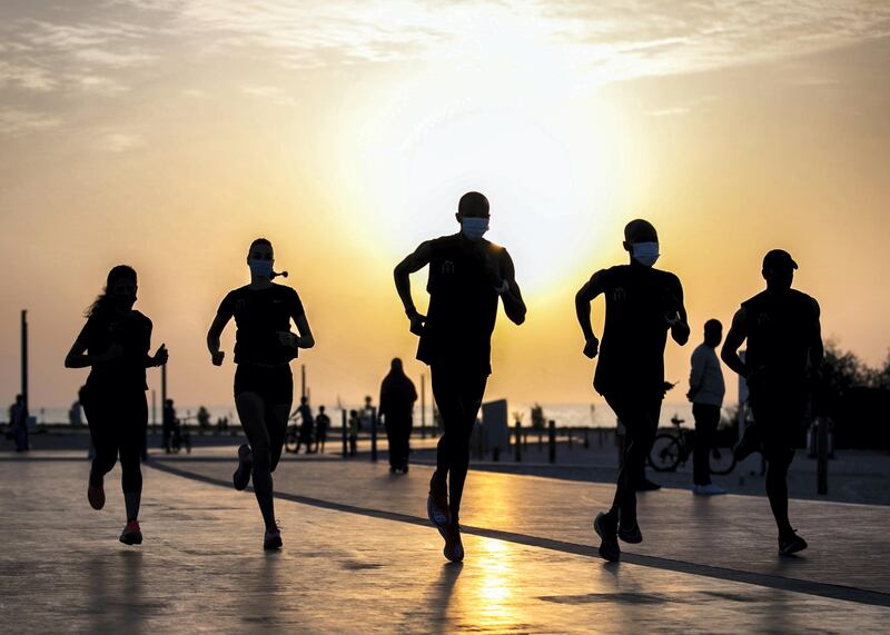 DUBAI, UNITED ARAB EMIRATES.  23 FEBRUARY 2021. 
Charles Rotich, Dennis Okwanga, and trainer Suleiman Baboo, train at Jumeirah's beach, 

Charles Rotich works as a pest-controller, grew up with the world’s top runner Eliud Kipchoge and they used to run together in the streets of Kenya as teenagers.

Photo: Reem Mohammed / The National
Reporter: Haneen Dajani
Section: NA