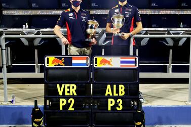 Verstappen and Albon show their trophies after the Bahrain Grand Prix. Getty