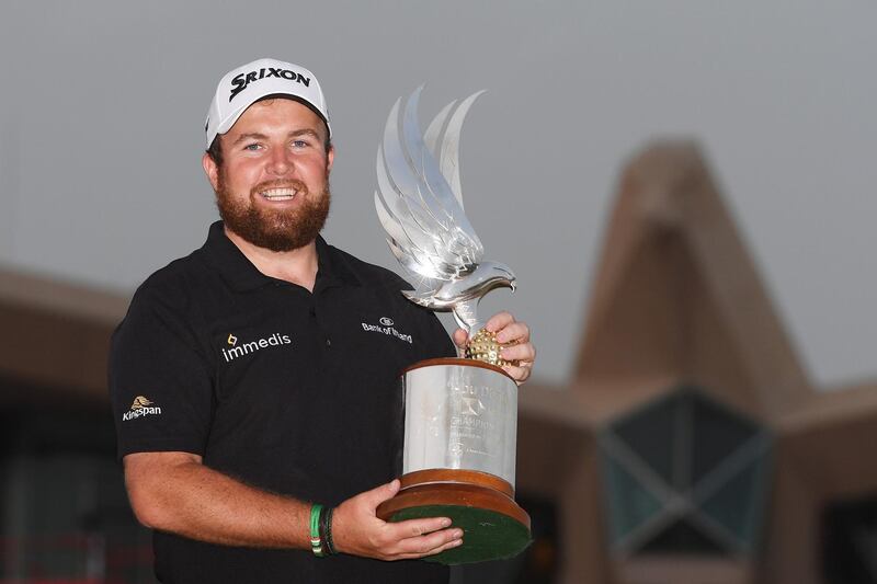 ABU DHABI, UNITED ARAB EMIRATES - JANUARY 19:  Shane Lowry of Ireland celebrates with the winner's trophy after Day Four of the Abu Dhabi HSBC Golf Championship at Abu Dhabi Golf Club on January 19, 2019 in Abu Dhabi, United Arab Emirates. (Photo by Ross Kinnaird/Getty Images)