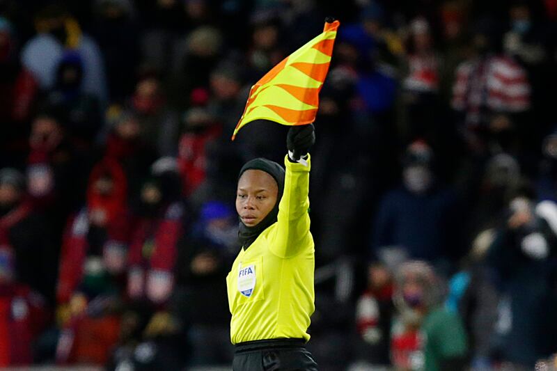 Stephanie-Dale Yee Sing works the sideline during the second half. AP Photo