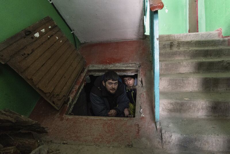 People shelter from shelling in the basement in Mariupol, Ukraine. Photo: Mstyslav Chernov / Associated Press