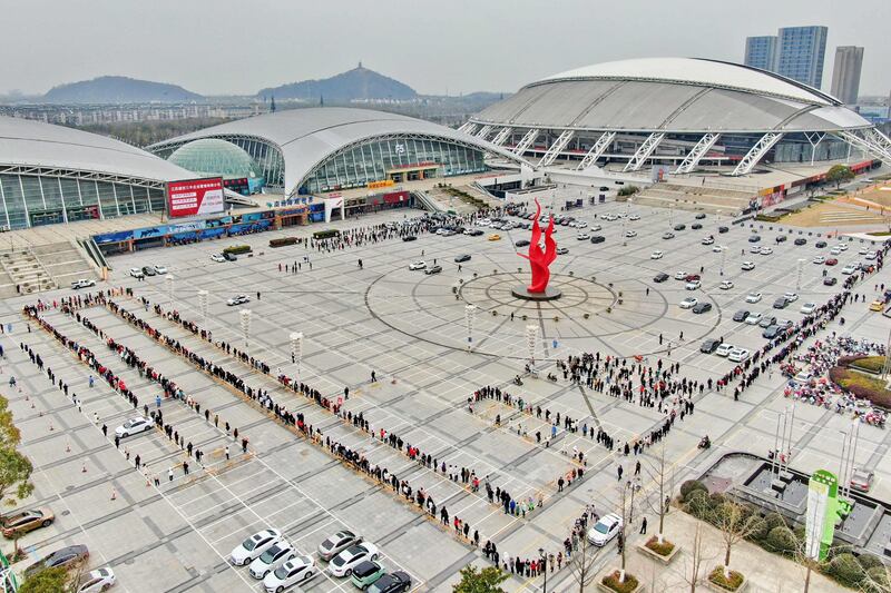 People queueing to undergo Covid-19 tests in Nantong, in China's eastern Jiangsu province. AFP