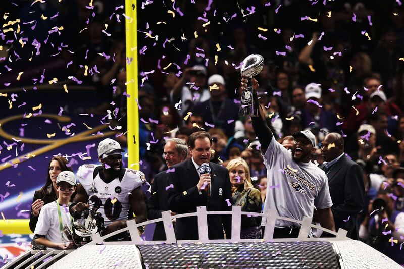 Ray Lewis #52 of the Baltimore Ravens celebrates with the Vince Lombardi trophy after the Ravens won 34-31 against the San Francisco 49ers during Super Bowl XLVII at the Mercedes-Benz Superdome on February 3, 2013 in New Orleans, Louisiana.   Win McNamee/Getty Images/AFP== FOR NEWSPAPERS, INTERNET, TELCOS & TELEVISION USE ONLY ==
 *** Local Caption ***  407946-01-09.jpg