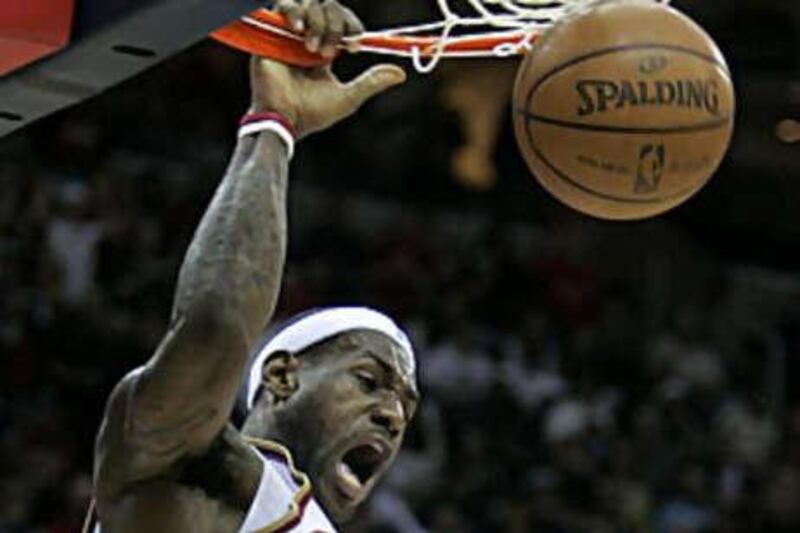 The Cleveland Cavaliers' LeBron James dunks the ball during their victory over the Utah Jazz.