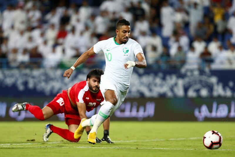 Saudi Arabia's Salem Al-Dawsari in action with Iraq's Mohammed Hameed. Reuters