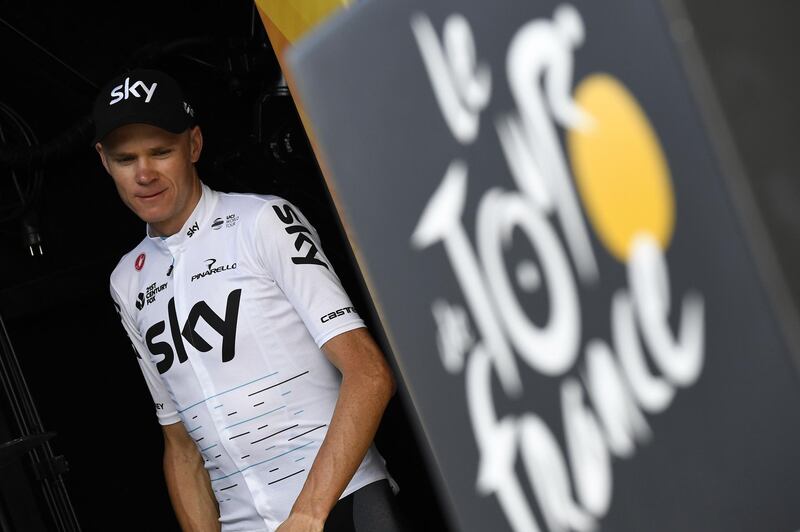 (FILES) In this file photo taken on July 06, 2017 Great Britain's Christopher Froome arrives on the podium to celebrate his overall leader yellow jersey at the end of the 216 km sixth stage of the 104th edition of the Tour de France cycling race between Vesoul and Troyes. Chris Froome was cleared on July 2, 2018 of wrongdoing in his 'anti-doping' case which had cast a shadow over his participation in the Tour de France. "The Union Cycliste Internationale (UCI) confirms that the anti-doping proceedings involving Mr Christopher Froome have now been closed," cycling's ruling body announced. Team Sky's four-time Tour de France champion has been under a cloud since he was found to have twice the permissible amount of asthma drug Salbutamol in his system during September's Vuelta a Espana, which he won.

 / AFP / Lionel BONAVENTURE
