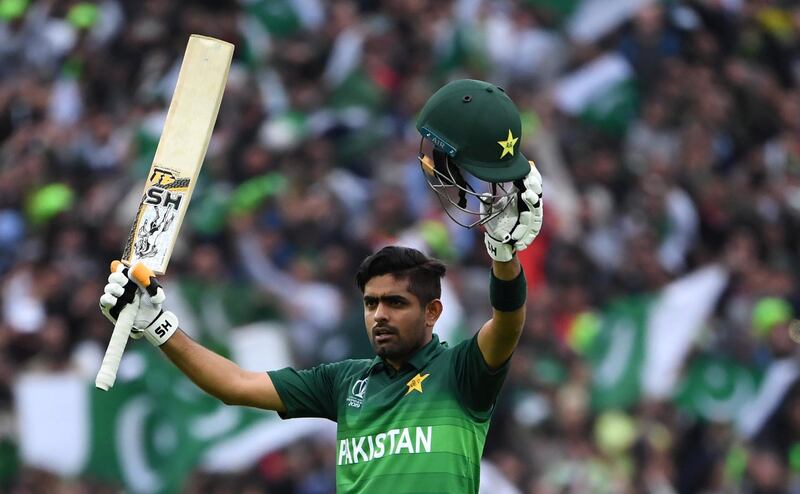 Pakistan's Babar Azam celebrates after scoring a century (100 runs) during the 2019 Cricket World Cup group stage match between New Zealand and Pakistan at Edgbaston in Birmingham, central England, on June 26, 2019. (Photo by Paul ELLIS / AFP) / RESTRICTED TO EDITORIAL USE