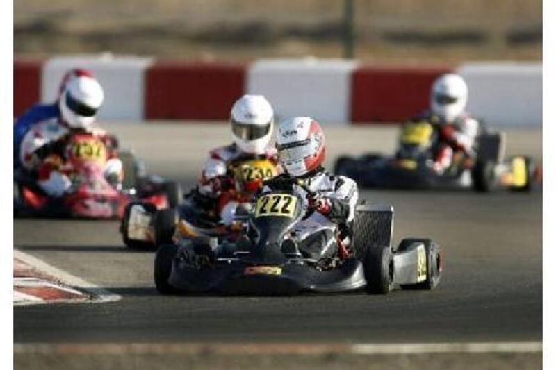 Mohammed al Dhaheri  leads the pack during the DD2 division qualifying race  yesterday in Al Ain.