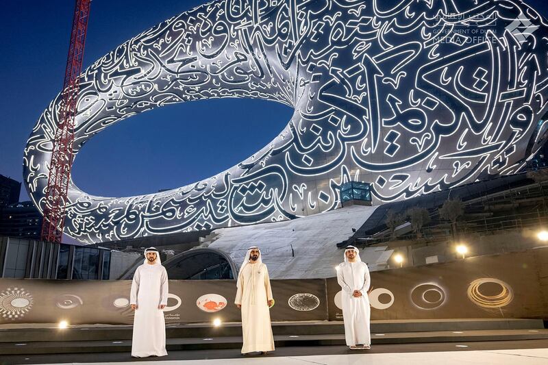 Sheikh Mohammed bin Rashid, Vice President and Ruler of Dubai, Dubai Crown Prince Sheikh Hamdan bin Mohammed, who is chairman of the Board of Trustees of Dubai Future Foundation, and Sheikh Maktoum bin Mohammed, Deputy Ruler of Dubai, witnesses the placement of the last panel of the Museum of the Future’s facade. Dubai Media Office