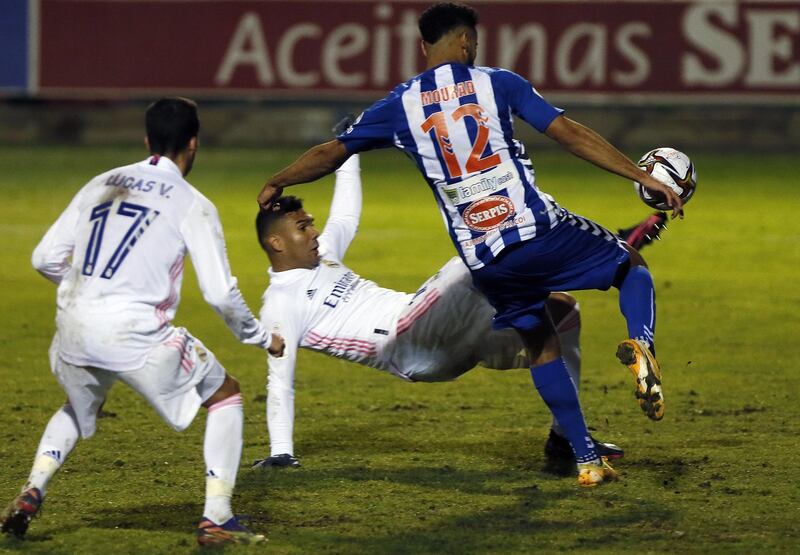 Real Madrid's Carlos Casemiro in action against Mourad El Ghezouani during their Copa del Rey defeat against Alcoyano on Wednesday, January 22. EPA