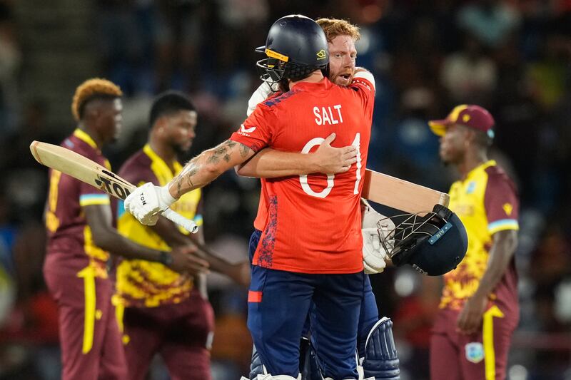 England's Phil Salt embraces teammate Jonny Bairstow after their win over the West Indies in their T20 World Cup Super Eight match at the Darren Sammy Cricket Stadium in St Lucia on Wednesday, June 19, 2024. AP