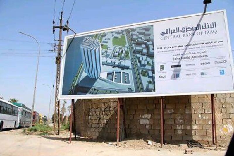 A billboard heralds the new headquarters of the Central Bank of Iraq in Baghdad. The proposed central bank will be the tallest building and the flagship for the planned regeneration of the city. Hadeel Al Sayegh / The National