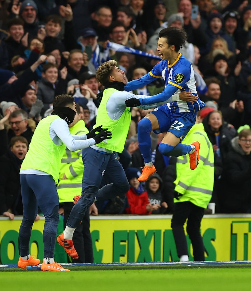 Kaoru Mitoma celebrates scoring their second goal. Action Images