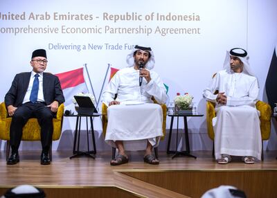 Minister of Economy Abdulla Bin Touq, centre and Minister of State for Foreign Trade Dr Thani Al Zeyoudi, right, pictured with Zulkifli Hasan, Minister of Trade for Indonesia, at the press conference on the UAE-Indonesia Comprehensive Economic Partnership Agreement. Victor Besa / The National