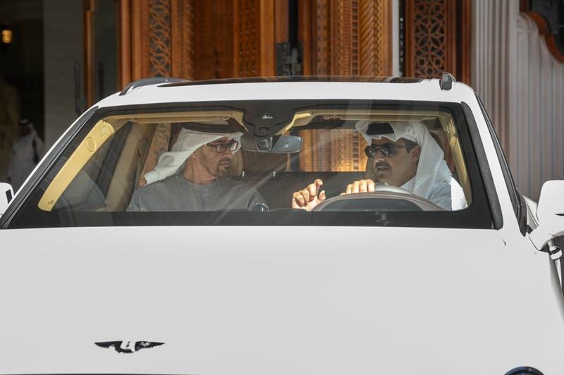 President Sheikh Mohamed is driven by the Emir of Qatar. Presidential Court