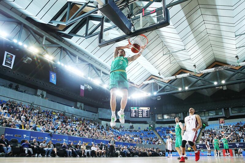 Australia's Nathan Sobey dunks against Qatar the FIBA World Cup Qualifier  in Melbourne. Getty Images
