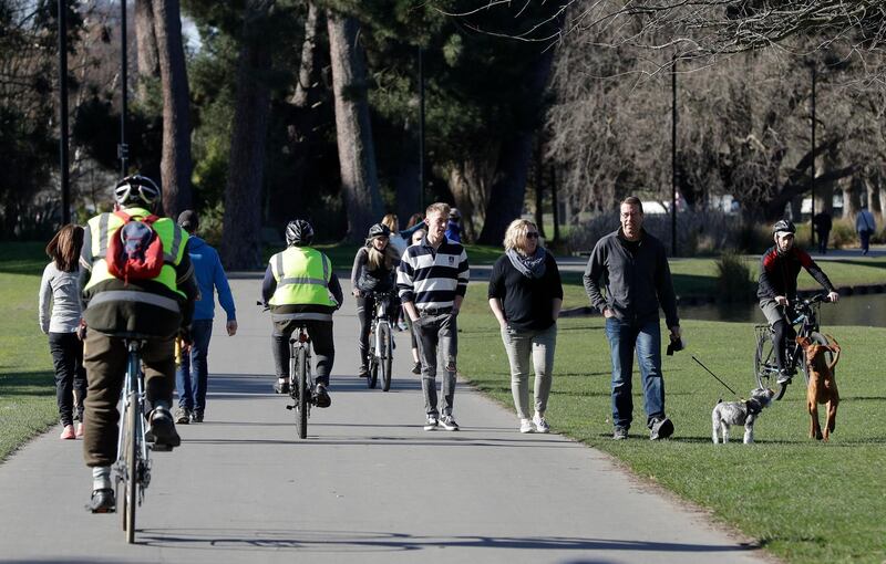 Residents exercise at Hagley Park in Christchurch, New Zealand. AP Photo