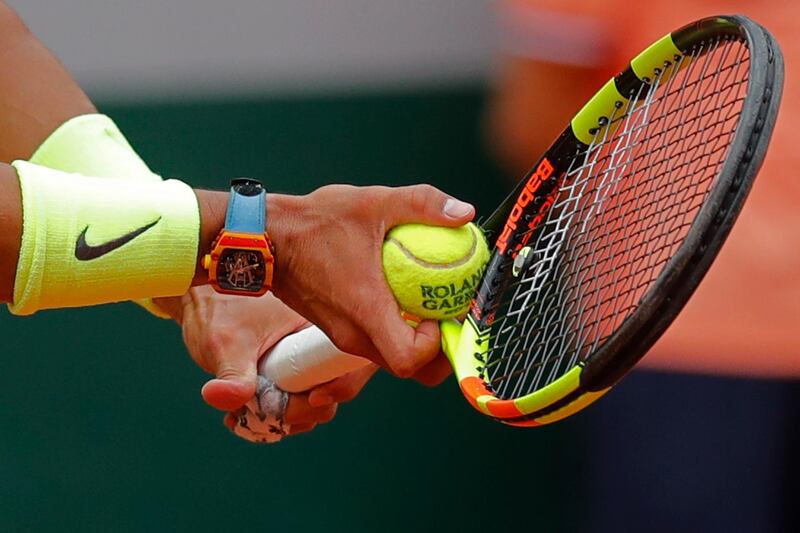 Nadal prepares to serve against Thiem. AP Photo