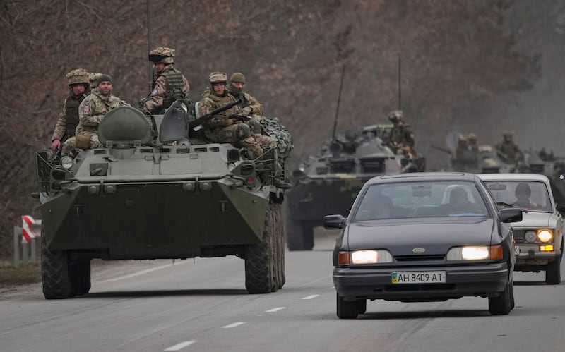 Ukrainian servicemen on tanks in the Donetsk region, eastern Ukraine. AP Photo