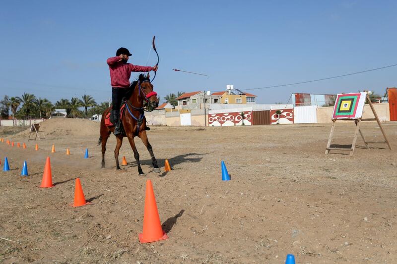 Staying calm and focused while standing up straight on a galloping horse is a challenge, says Mohammad Abu Musaed. Reuters