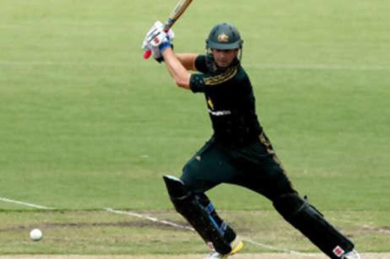 The Australian batsmen Shaun Marsh plays a shot, helping Australia to victory in the second one-day cricket international against Bangladesh in Darwin, Australia.