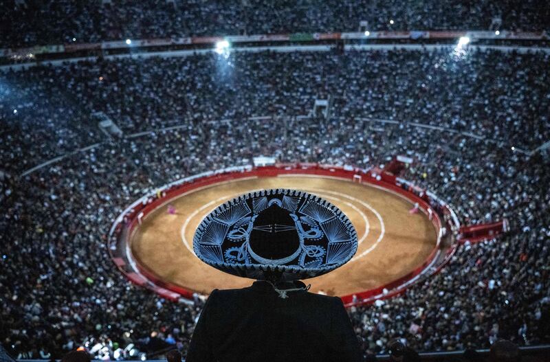An audience watches a bullfight at the Monumental Plaza de Toros Mexico in Mexico City, after the Supreme Court revoked a ban on bullfighting on Sunday. AFP