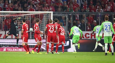 Soccer Football - Bundesliga - FC Bayern Munich vs VfL Wolfsburg - Allianz Arena, Munich, Germany - September 22, 2017   Wolfsburg's Maximilian Arnold scores their first goal from a free kick as Bayern Munich's Sven Ulreich attempts to make a save   REUTERS/Michael Dalder    DFL RULES TO LIMIT THE ONLINE USAGE DURING MATCH TIME TO 15 PICTURES PER GAME. IMAGE SEQUENCES TO SIMULATE VIDEO IS NOT ALLOWED AT ANY TIME. FOR FURTHER QUERIES PLEASE CONTACT DFL DIRECTLY AT + 49 69 650050