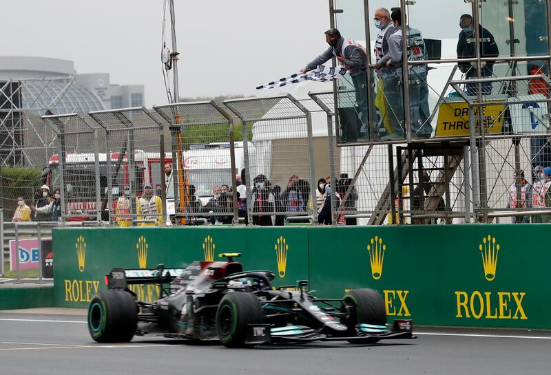 Mercedes' Valtteri Bottas takes the chequered flag to win the Turkish GP on Sunday.  Reuters