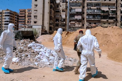 epa07792264 Investigators of Lebanon's military intelligence inspect the site after an alleged attack carried by two Israeli drones, in the southern suburb of Beirut, Lebanon, 25 August 2019. According to the Lebanese Armed Forces (LAF), two Israeli drones violated the Lebanese airspace over the southern suburbs of Beirut, adding that one fell down while the second exploded causing material damage. Hezbollah media office said that the drone caused damage to its media center, hours after Israel launched air strikes in Damascus, Syria.  EPA/NABIL MOUNZER