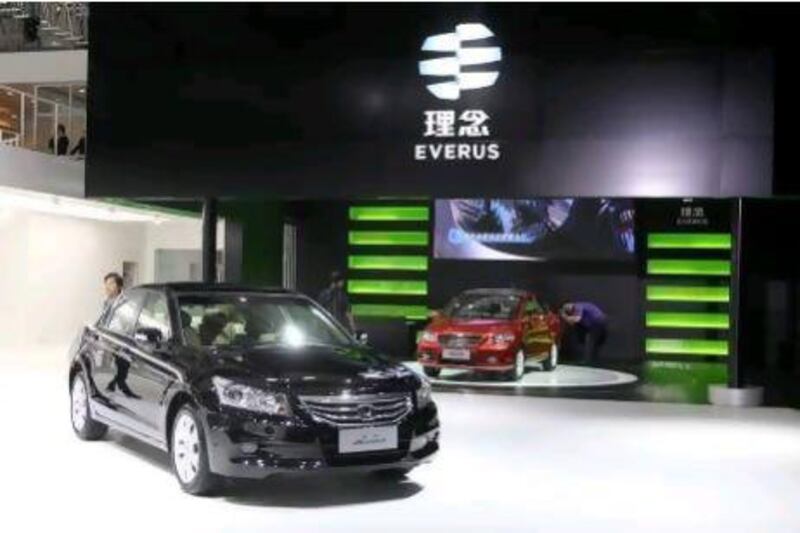 An Honda Accord and an Everus S1 are pictured during the 9th China (Guangzhou) International Automobile Exhibition. Imaginechina via AP Images