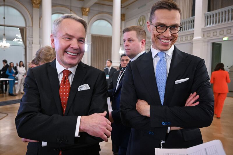 Alexander Stubb, right, from the National Coalition Party, and Pekka Haavisto, from the Greens, during Finland's presidential election first round in Helsinki on January 28. EPA