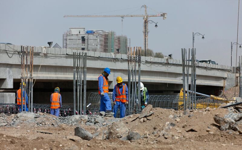 MUSCAT, OMAN - MARCH 25: Construction worker on a construction site on March 25, 2012, in Muscat, Oman. Photo by Thomas Imo/Photothek via Getty Images)***Local Caption***