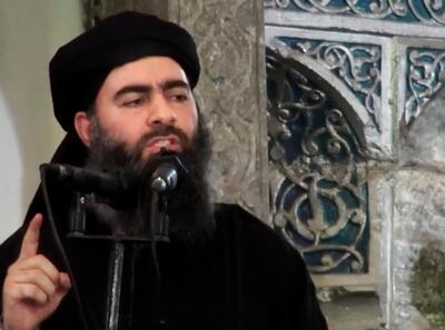 FILE - This image made from video posted on a militant website July 5, 2014, purports to show the leader of the Islamic State group, Abu Bakr al-Baghdadi, delivering a sermon at a mosque in Iraq during his first public appearance. The Islamic State group has released a new militant audio recording, purportedly of its shadowy leader Abu Bakr al-Baghdadi, his first in almost a year.  In the audio, al-Baghdadi â€” whose whereabouts and fate remain unknown â€” urges followers to "persevere" and continue fighting the group's enemies everywhere. The 54-minute audio entitled "Give Glad Tidings to the Patient" was released by the extremist group's central media arm, al-Furqan Foundation, on Wednesday evening, Aug. 22, 2018. (Militant video via AP, File)