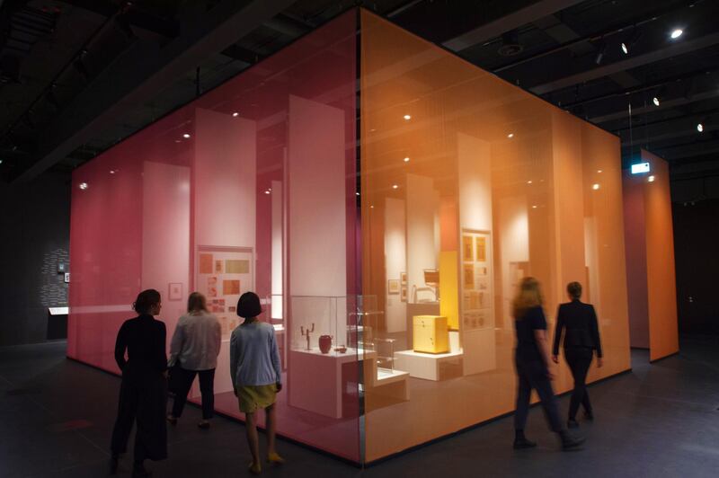 People walk in one of the exhibition halls of the new Bauhaus Museum in Dessau, Germany, Saturday, Sept. 7, 2019. The collection of the Bauhaus Dessau Foundation comprises around 49,000 catalogued exhibits and is the second-largest collection worldwide on the theme of the Bauhaus. The official opening of the new Bauhaus Museum, built for the centenary of the founding of the Bauhaus, will take place on Sunday, Sept. 8, 2019. (AP Photo/Jens Meyer)