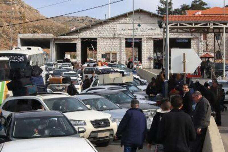 Palestinian refugees and others who fled the Damascus suburb of Yarmuk and the Yarmuk refugee camp arrive at the Masnaa Lebanese border crossing to flee Syria.