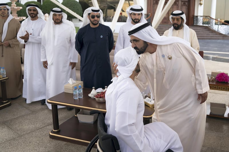 ABU DHABI, UNITED ARAB EMIRATES - February 19, 2018: HH Sheikh Mohamed bin Rashid Al Maktoum, Vice-President, Prime Minister of the UAE, Ruler of Dubai and Minister of Defence (R) receives HH Sheikh Zayed bin Hamdan bin Zayed Al Nahyan (2nd R), who was injured on August 2017, while serving in Yemen. Seen with (back R-L) HH Sheikh Tahnoon bin Mohamed Al Nahyan, Ruler's Representative in Al Ain Region, HH Sheikh Hamdan bin Mohamed Al Maktoum, Crown Prince of Dubai, HH Sheikh Hamdan bin Zayed Al Nahyan, Ruler’s Representative in Al Dhafra Region, HH Sheikh Mohamed bin Butti Al Hamed, HH Sheikh Nahyan Bin Zayed Al Nahyan, Chairman of the Board of Trustees of Zayed bin Sultan Al Nahyan Charitable and Humanitarian Foundation and HH Sheikh Mansour bin Zayed Al Nahyan, UAE Deputy Prime Minister and Minister of Presidential Affairs.

( Abdullah Al Junaibi for the Crown Prince Court - Abu Dhabi )
---