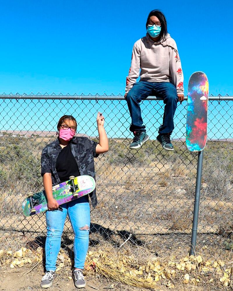 Jacque Thorpe and Terrill Humeyestewa, who helped create the skate park, take a break from skateboarding. AP