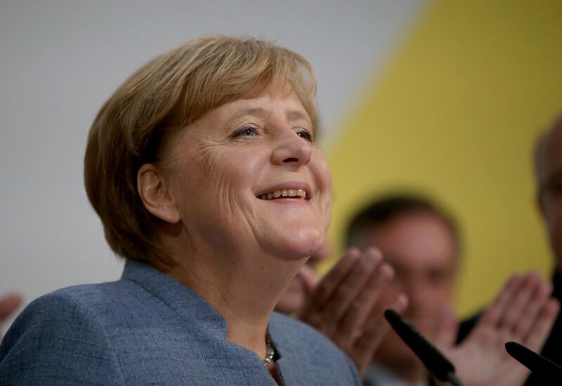 German Chancellor Angela Merkel arrives for  a statement on the parliament election at the headquarters of the Christian Democratic Union CDU in Berlin, Germany, Sunday, Sept. 24, 2017.  (Joerg Carstensen/dpa via AP)